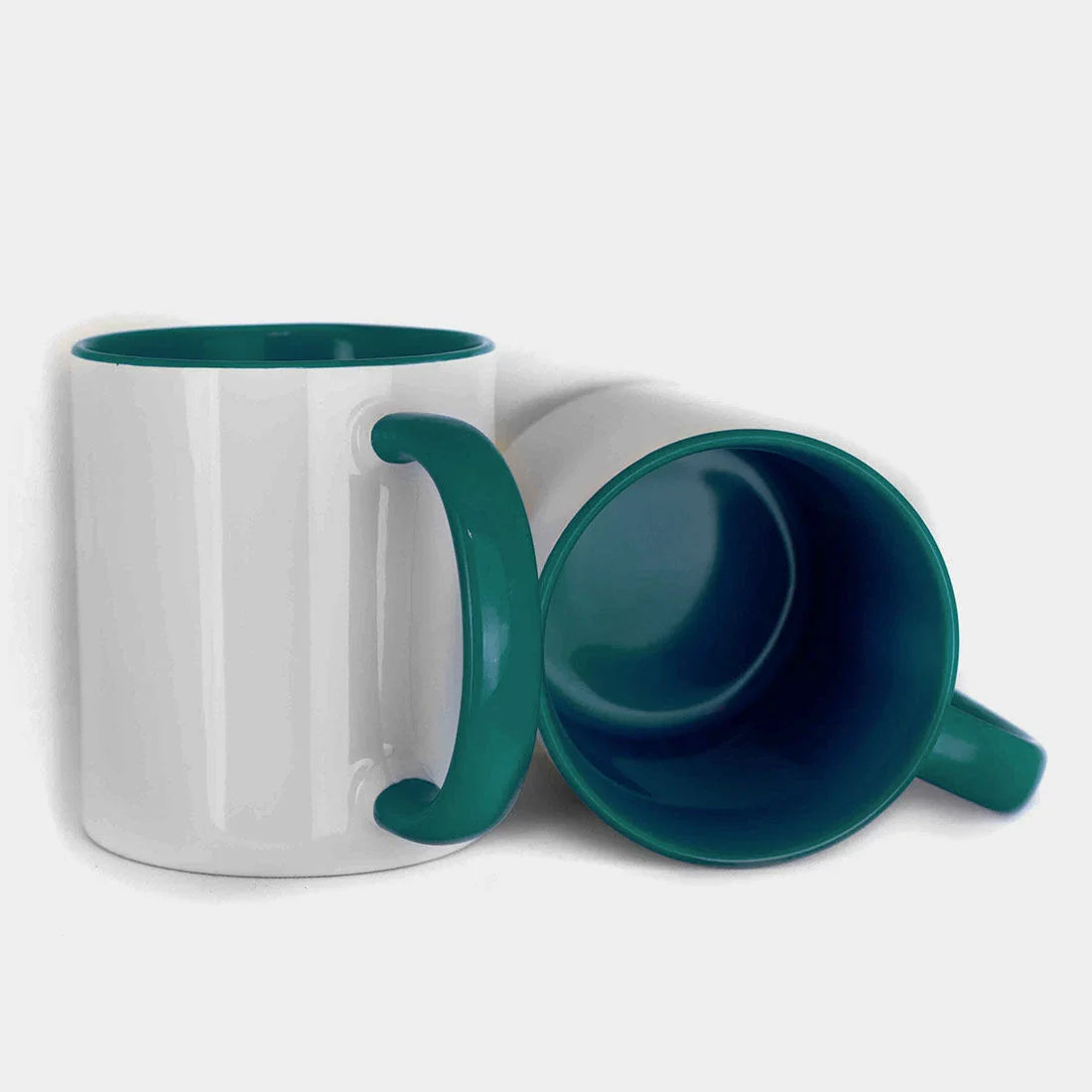 11oz inner colored sublimation mugs with teal handle and teal interior, blank white exterior ready for custom printing.