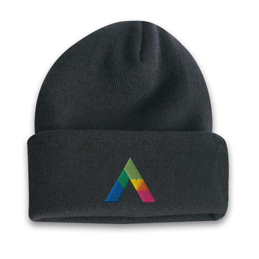 Acrylic roll up knit toque beanie in black with a multicolor embroidered logo on the front cuff.