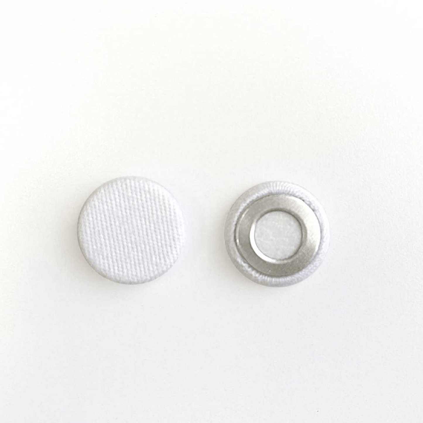 White replaceable snap buttons for chef coat with mesh yoke, front and back view