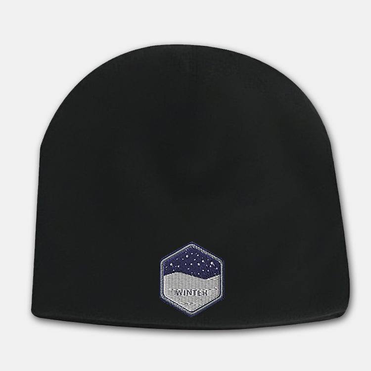 Black deluxe fleece beanie with embroidered winter badge logo on the front