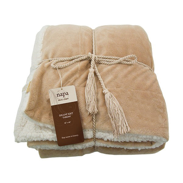 Tan deluxe lambswool throw blanket with soft fleece lining and rope tie, packaged with tag