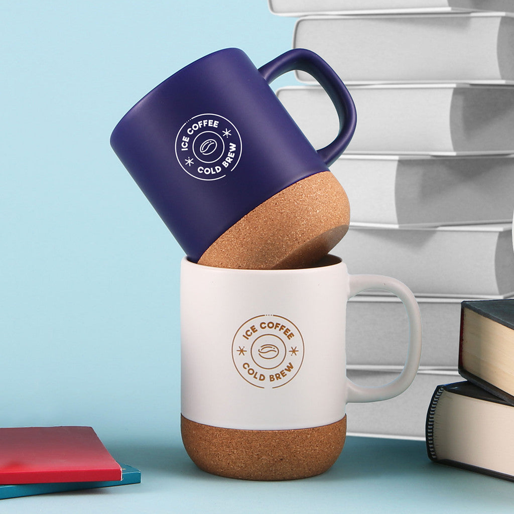 Evora 325ml ceramic mugs with cork base, featuring blue and white color options and iced coffee Cold Brew logo, ideal for eco-friendly drinkware and promotional gifts