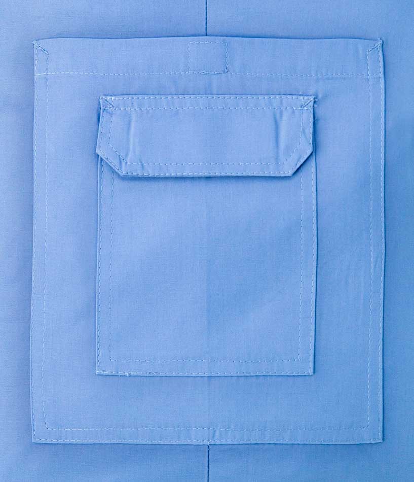Close-up view of light blue medical scrub cargo pocket with flap detail and reinforced stitching