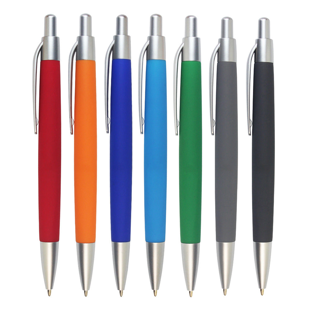 Promo click-action plastic ballpoint pens in assorted colors with no logo or print, displayed in a row.