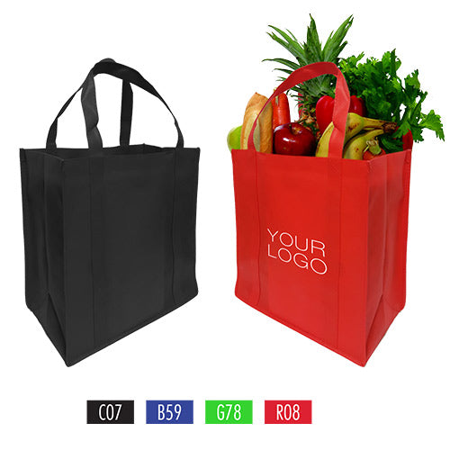 Black and red reusable non-woven grocery bag filled with fresh fruit and vegetables.