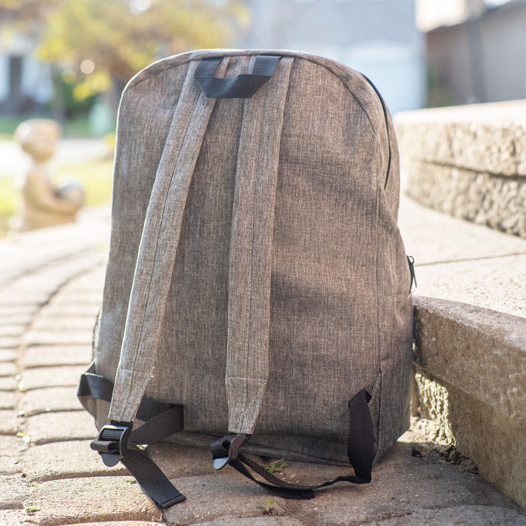 Tecumseh heather backpack 12"W x 7"D x 18"H in black with front zipper pocket, mesh side pocket, and custom CRM logo print