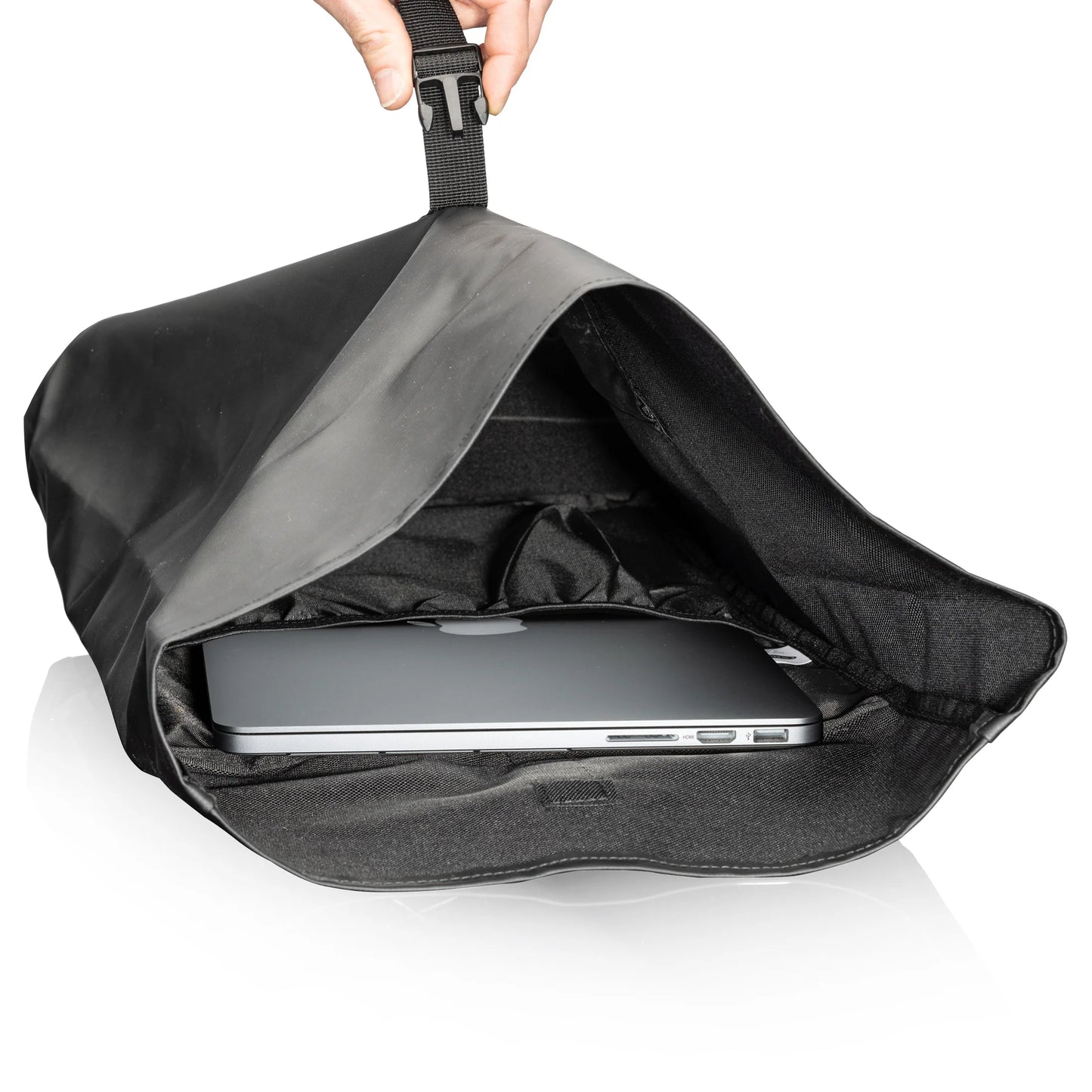 Hazen backpack 15.625"W x 16.75"H x 4.5"D shown open with roll-top closure and padded laptop compartment holding a silver laptop