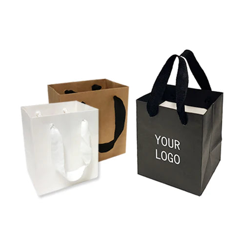 Extra small Manhattan style heavy weight paper bags 200gsm in black, white, and kraft with custom logo print and sturdy handles, 5 inches wide, 4 inches deep, 6 inches high
