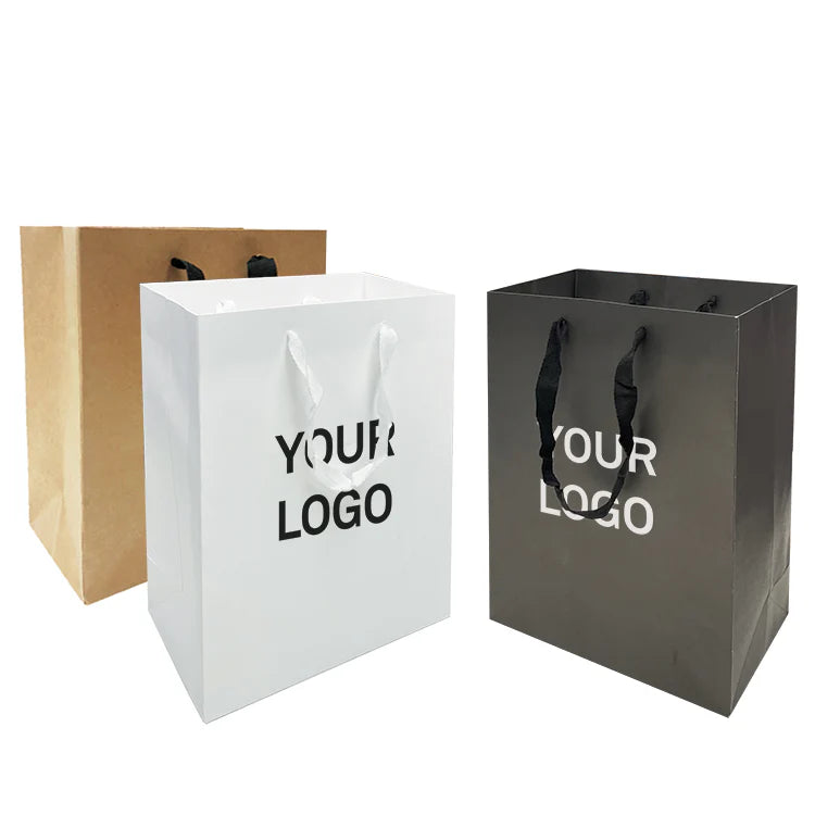 Manhattan style heavyweight paper bags, 200gsm, medium size 10 inches wide by 5 inches deep by 13 inches high, shown in kraft, white, and black with custom logo and rope handles.