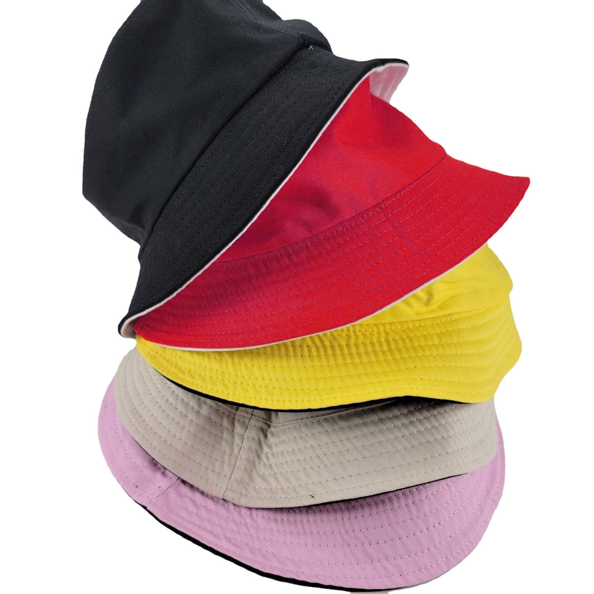 Stack of bucket hats in black, red, yellow, khaki, and pink colors, displayed in a layered arrangement for variety selection.